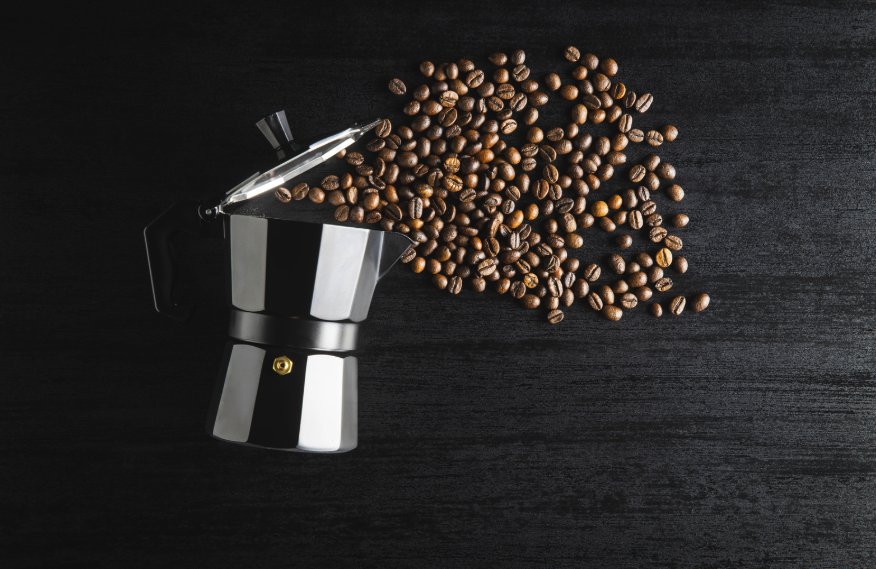 Moka pot with coffee beans